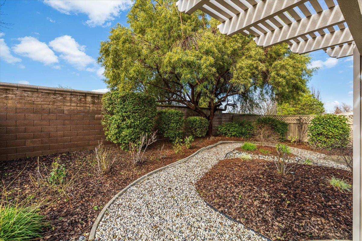 596 Geary Lane Lincoln, CA 95648 - Photo 24 of 27 a view of a pathway with a yard