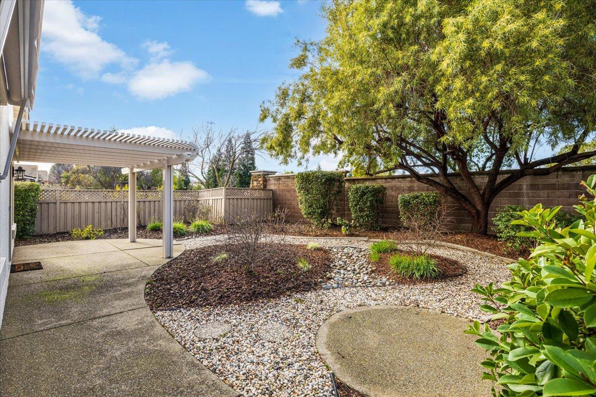 596 Geary Lane Lincoln, CA 95648 - Photo 26 of 27 a view of a backyard with pathway