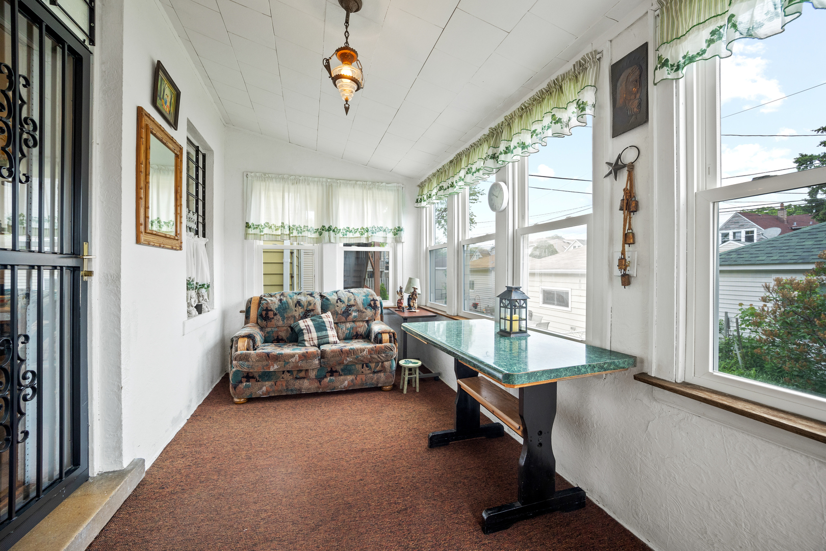 5124 West Nelson Street Chicago, IL 60641 - Photo 19 of 21 a living room with furniture and a large window