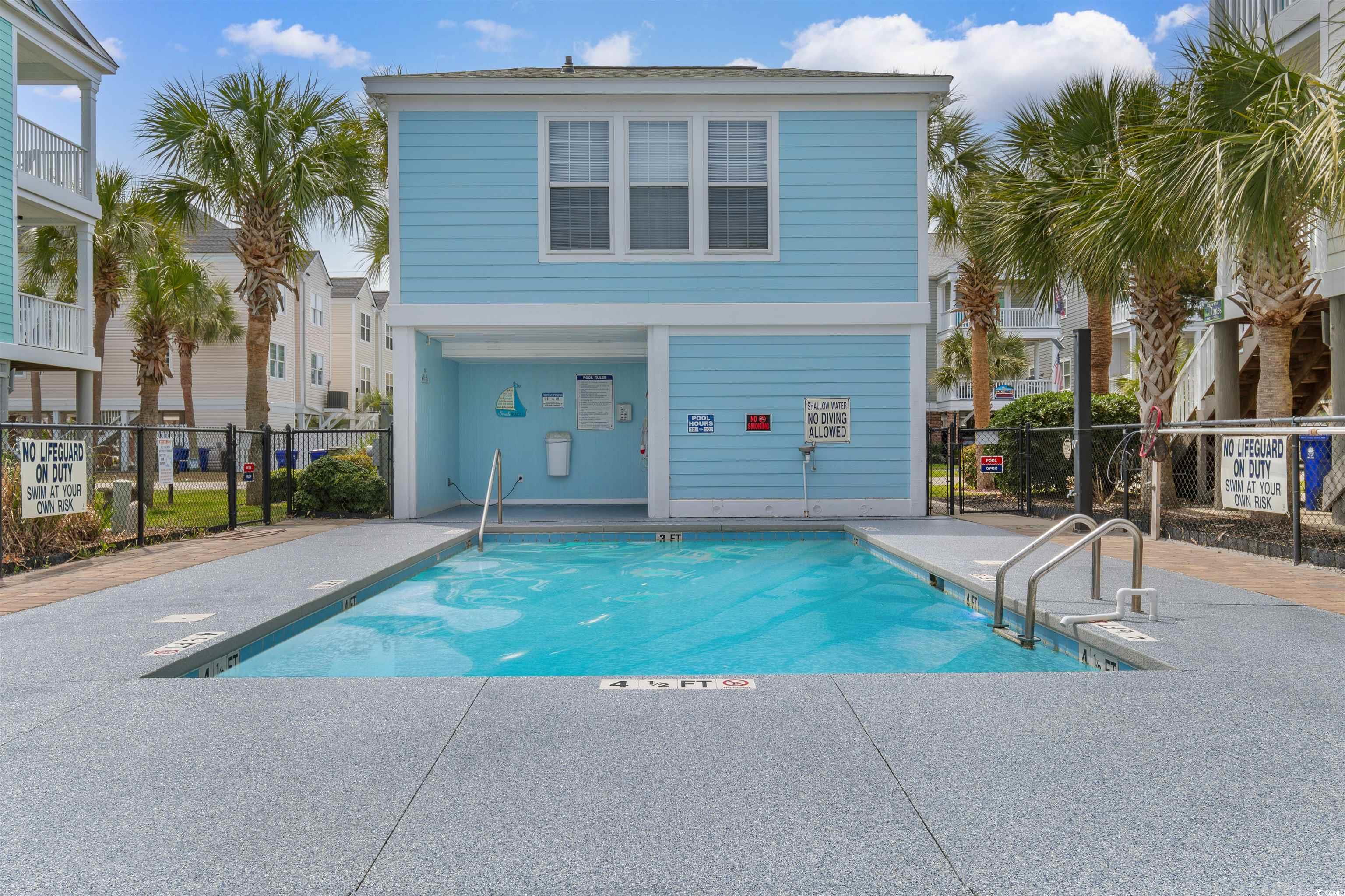 808 North Ocean Boulevard Surfside Beach, SC 29575 - Photo 12 of 39 View of swimming pool with a patio area, fence, an
