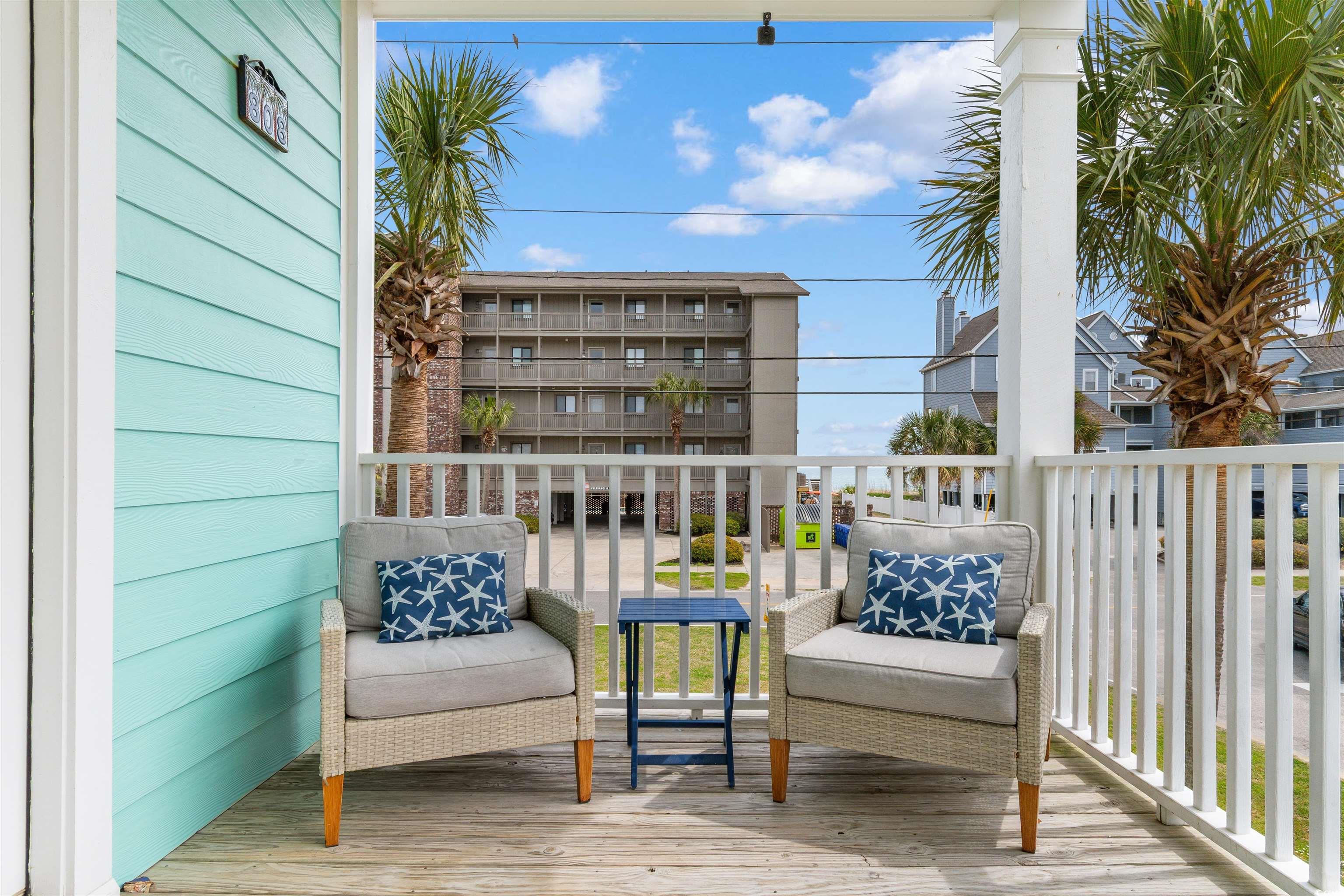 808 North Ocean Boulevard Surfside Beach, SC 29575 - Photo 20 of 39 Covered porch with ocean view