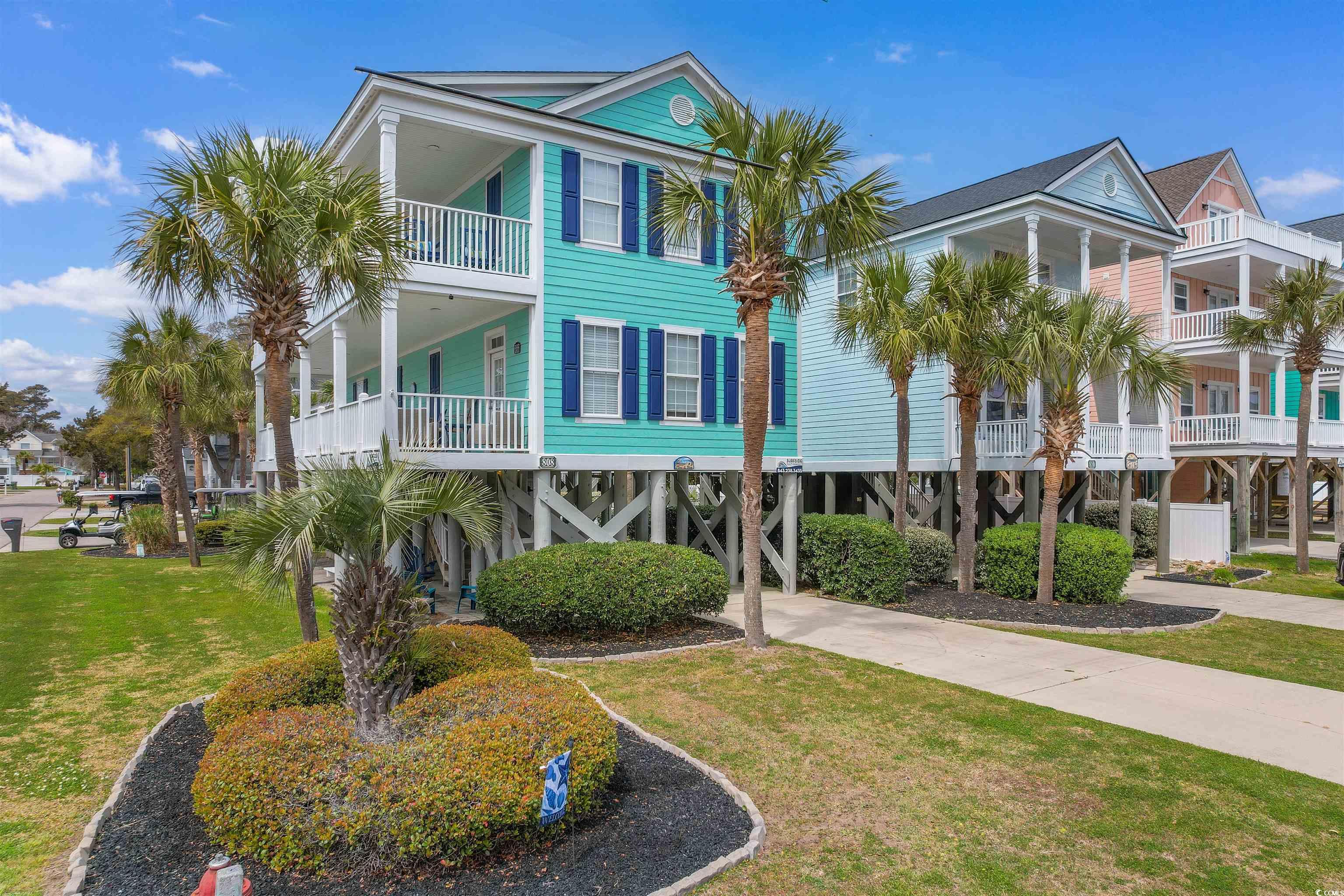 808 North Ocean Boulevard Surfside Beach, SC 29575 - Photo 3 of 39 View of front of property with a front lawn and co