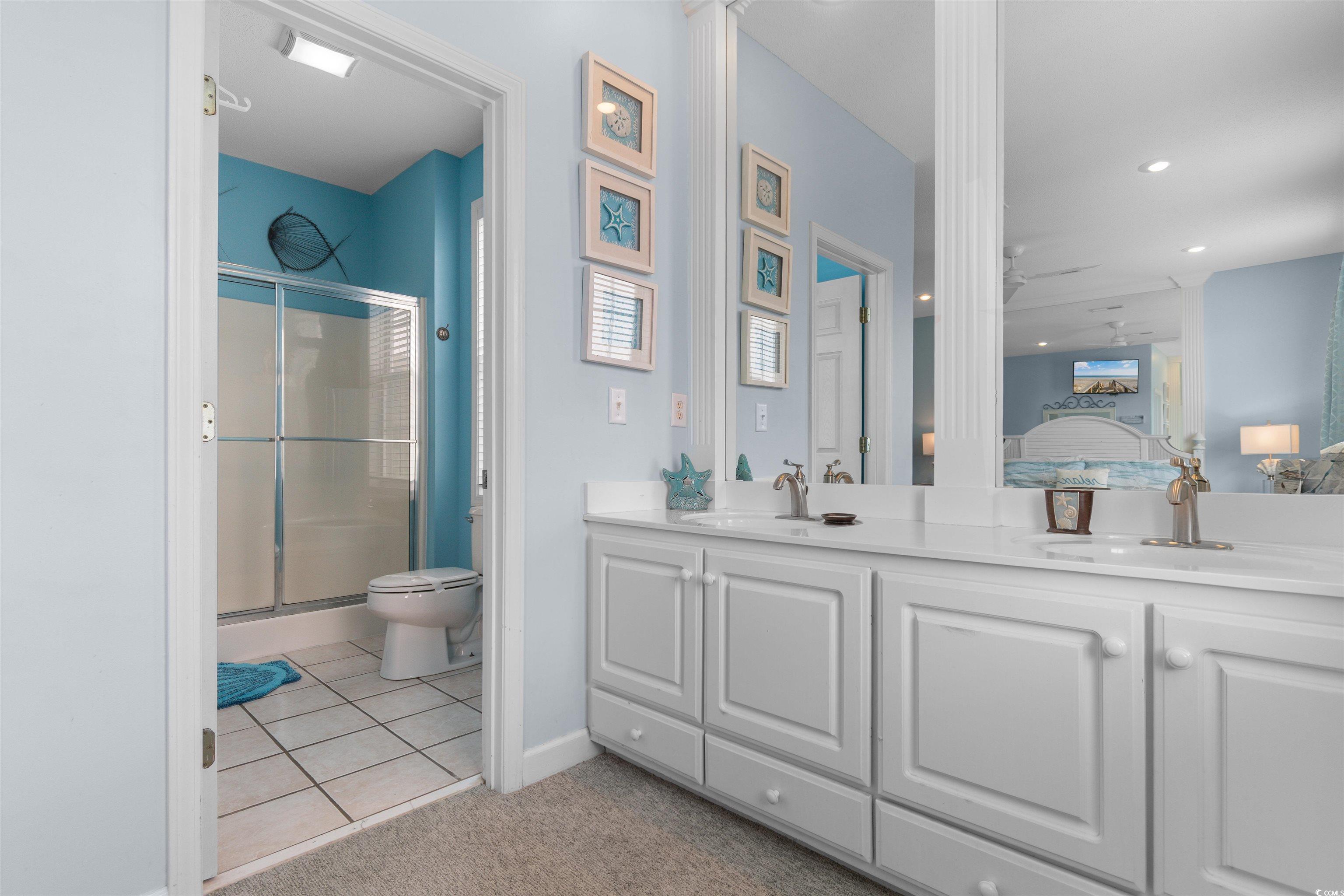 808 North Ocean Boulevard Surfside Beach, SC 29575 - Photo 29 of 39 Double vanity, and ensuite bathroom