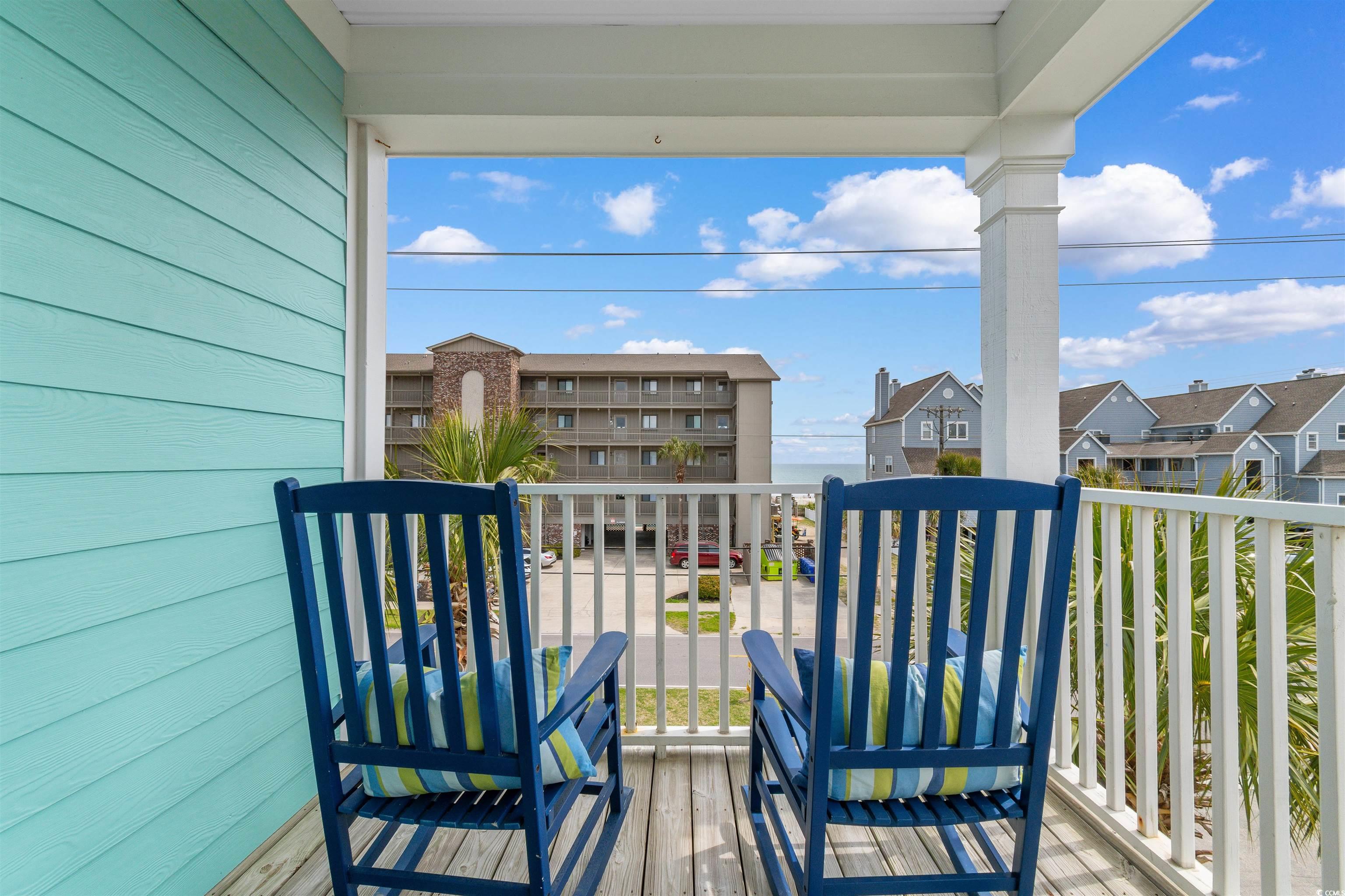 808 North Ocean Boulevard Surfside Beach, SC 29575 - Photo 32 of 39 Second level covered porch with ocean view