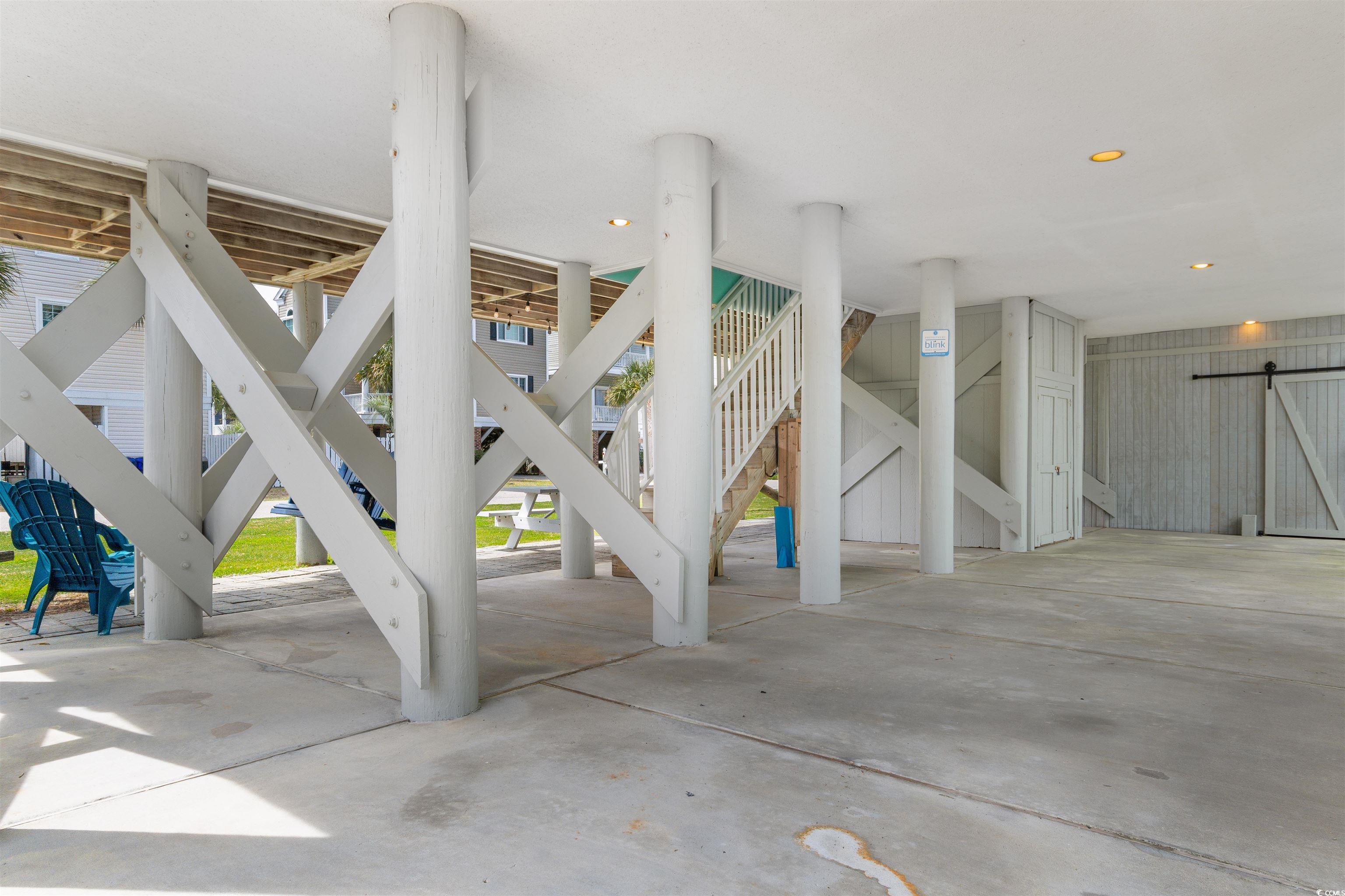 808 North Ocean Boulevard Surfside Beach, SC 29575 - Photo 37 of 39 Covered parking under house