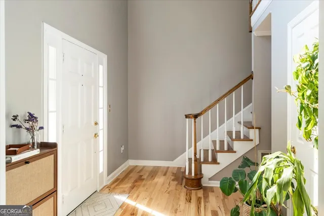 a bedroom with a bed and furniture