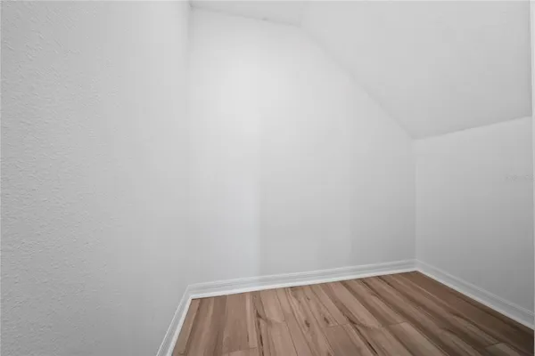 a bedroom with a bed and a cabinets