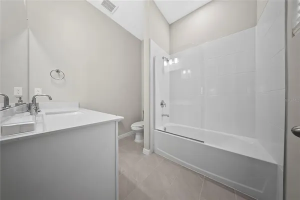 a view of empty room with a window