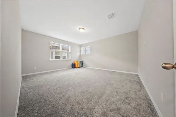 a view of a livingroom with furniture and window