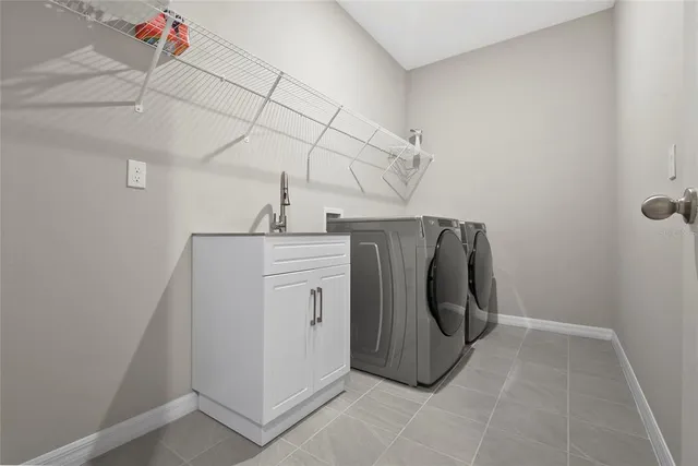 a view of a livingroom with furniture and a window