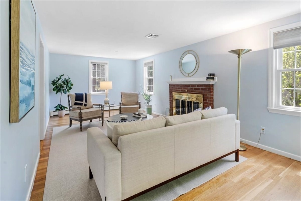 60 Old County Road Hingham, MA 02043 - Photo 14 of 32 a living room with furniture a fireplace and a window