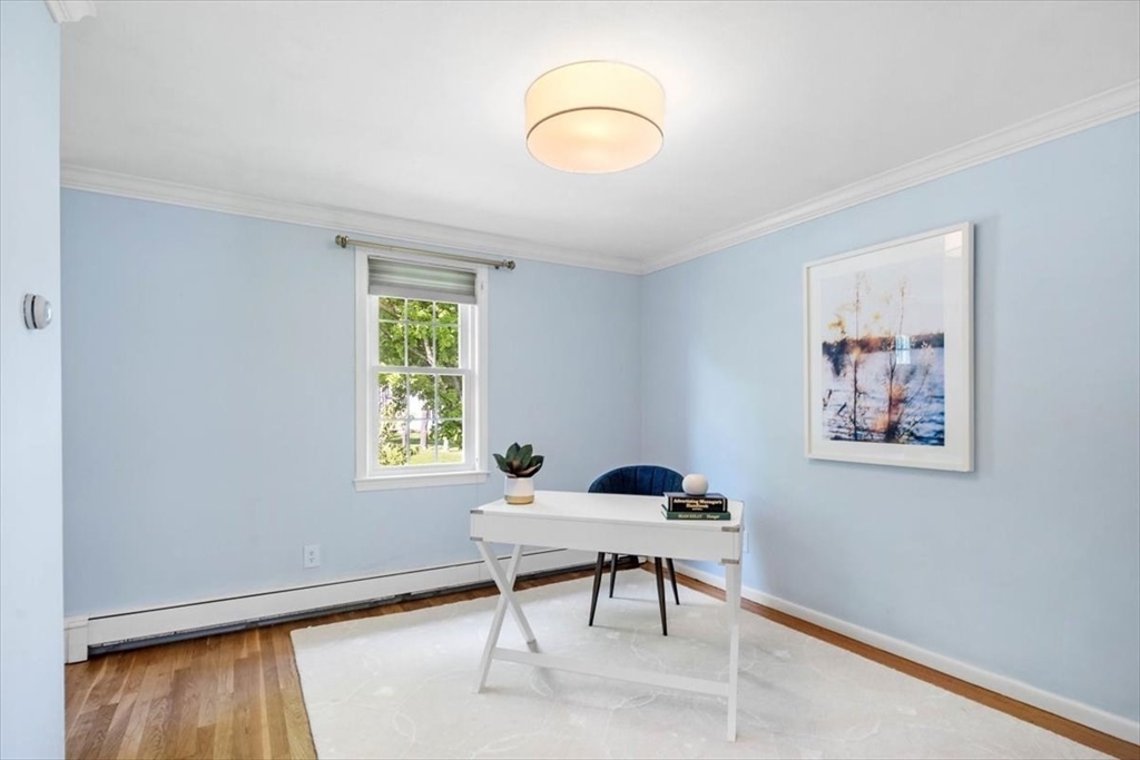 60 Old County Road Hingham, MA 02043 - Photo 17 of 32 a living room with furniture and a window