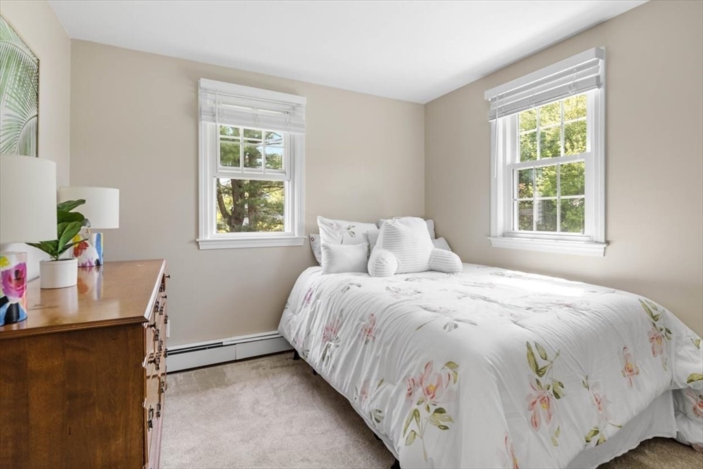 60 Old County Road Hingham, MA 02043 - Photo 20 of 32 a bedroom with a bed and a window
