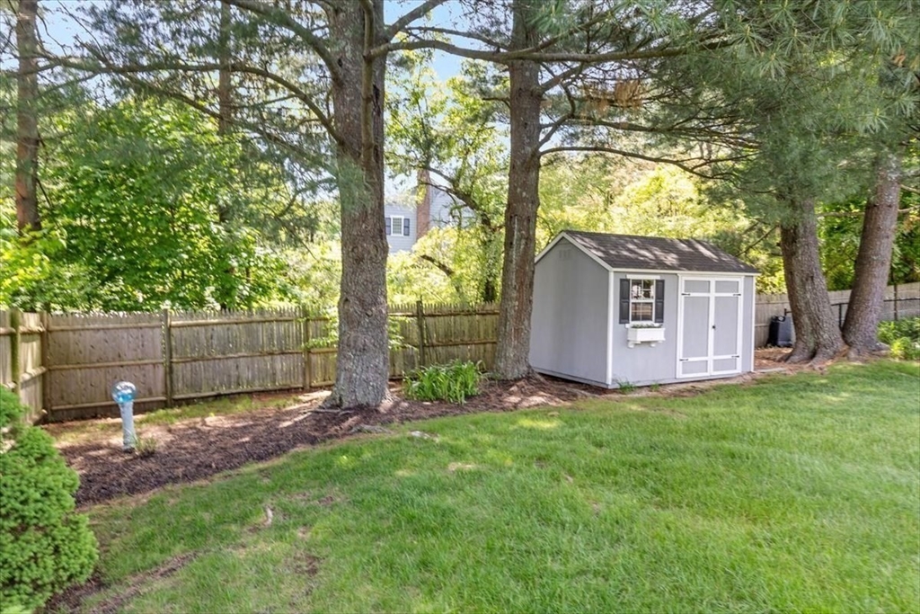 60 Old County Road Hingham, MA 02043 - Photo 25 of 32 a view of a backyard with a tree
