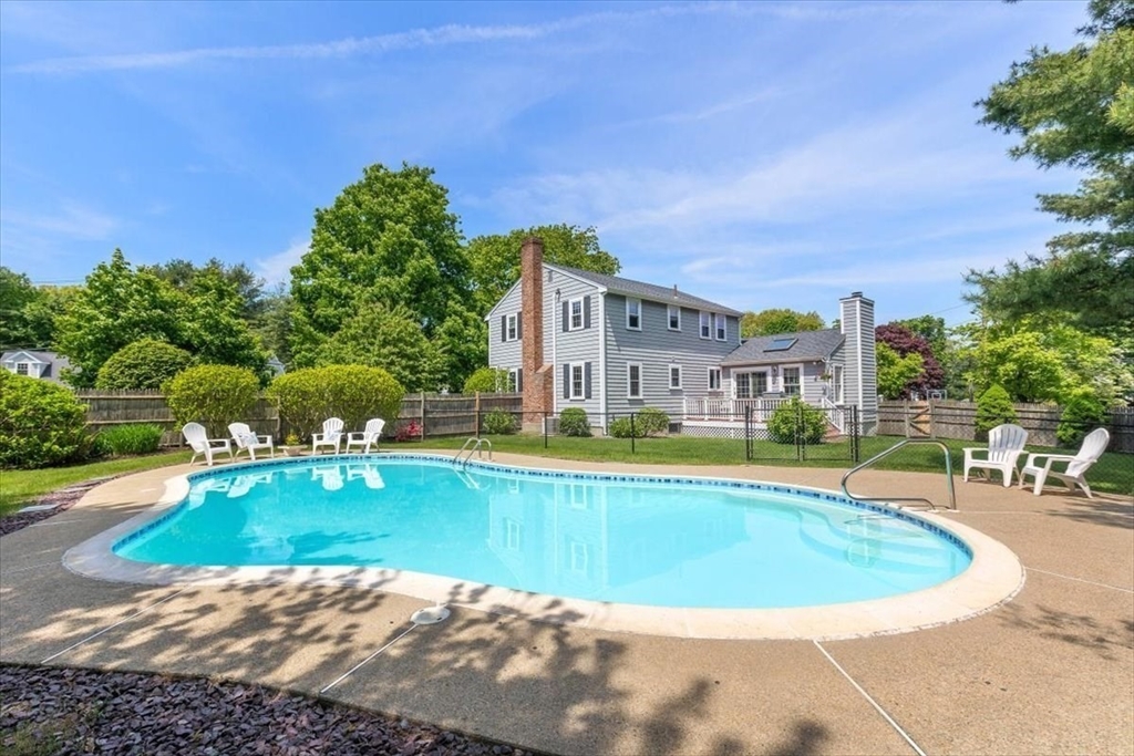 60 Old County Road Hingham, MA 02043 - Photo 27 of 32 a view of a swimming pool and a yard