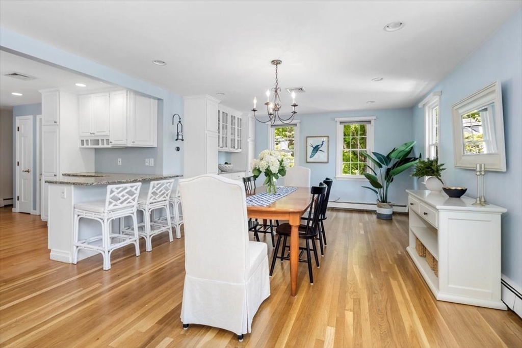 60 Old County Road Hingham, MA 02043 - Photo 8 of 32 a view of a dining room with furniture and wooden floor
