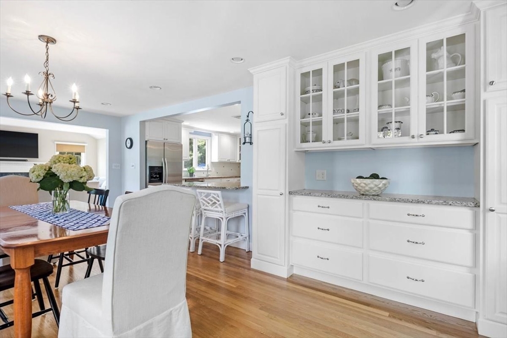 60 Old County Road Hingham, MA 02043 - Photo 9 of 32 a living room with granite countertop furniture and a wooden floor