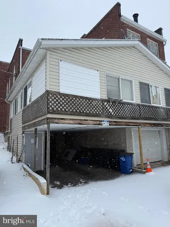 a view of a house with a garage