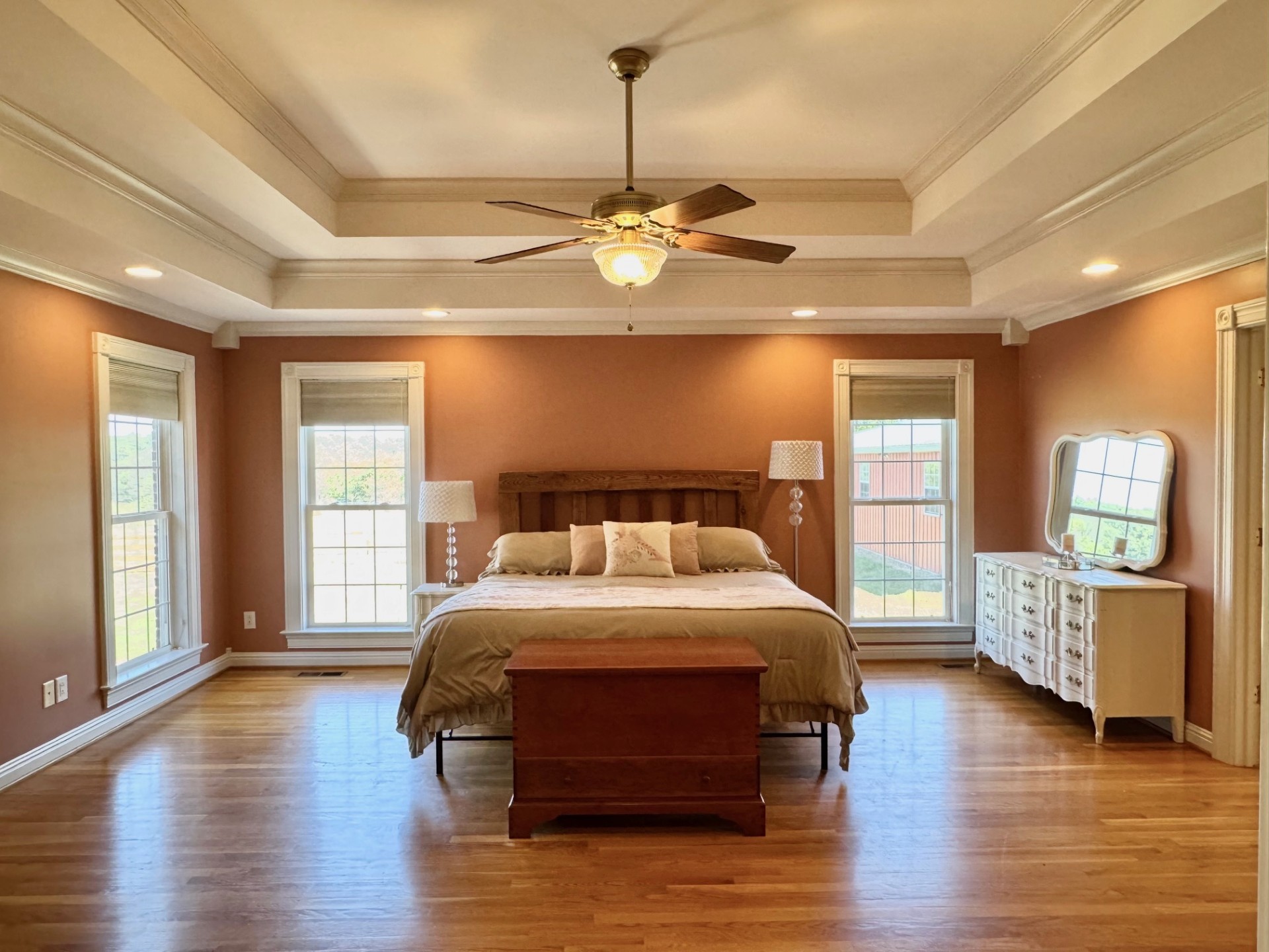 399 Edgar Meeks Road Burns, TN 37029 - Photo 22 of 28 a bedroom with a bed chandelier and a window