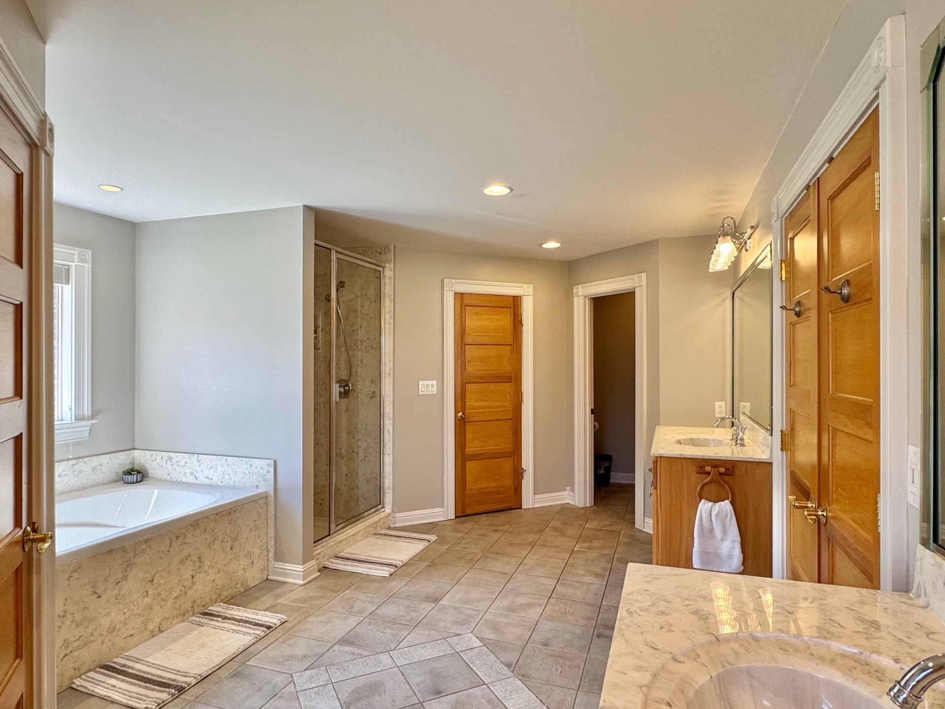 399 Edgar Meeks Road Burns, TN 37029 - Photo 24 of 28 a spacious bathroom with a tub and shower