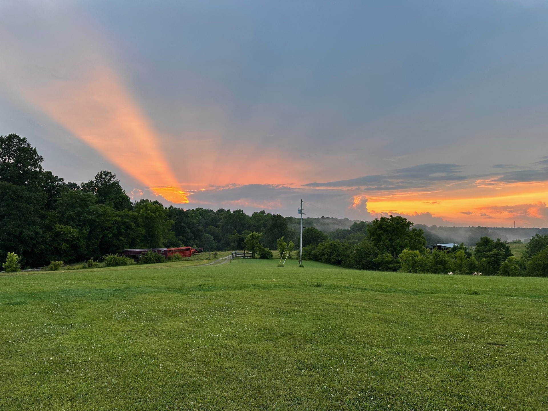 399 Edgar Meeks Road Burns, TN 37029 - Photo 28 of 28 a backyard of a house with lots of green space