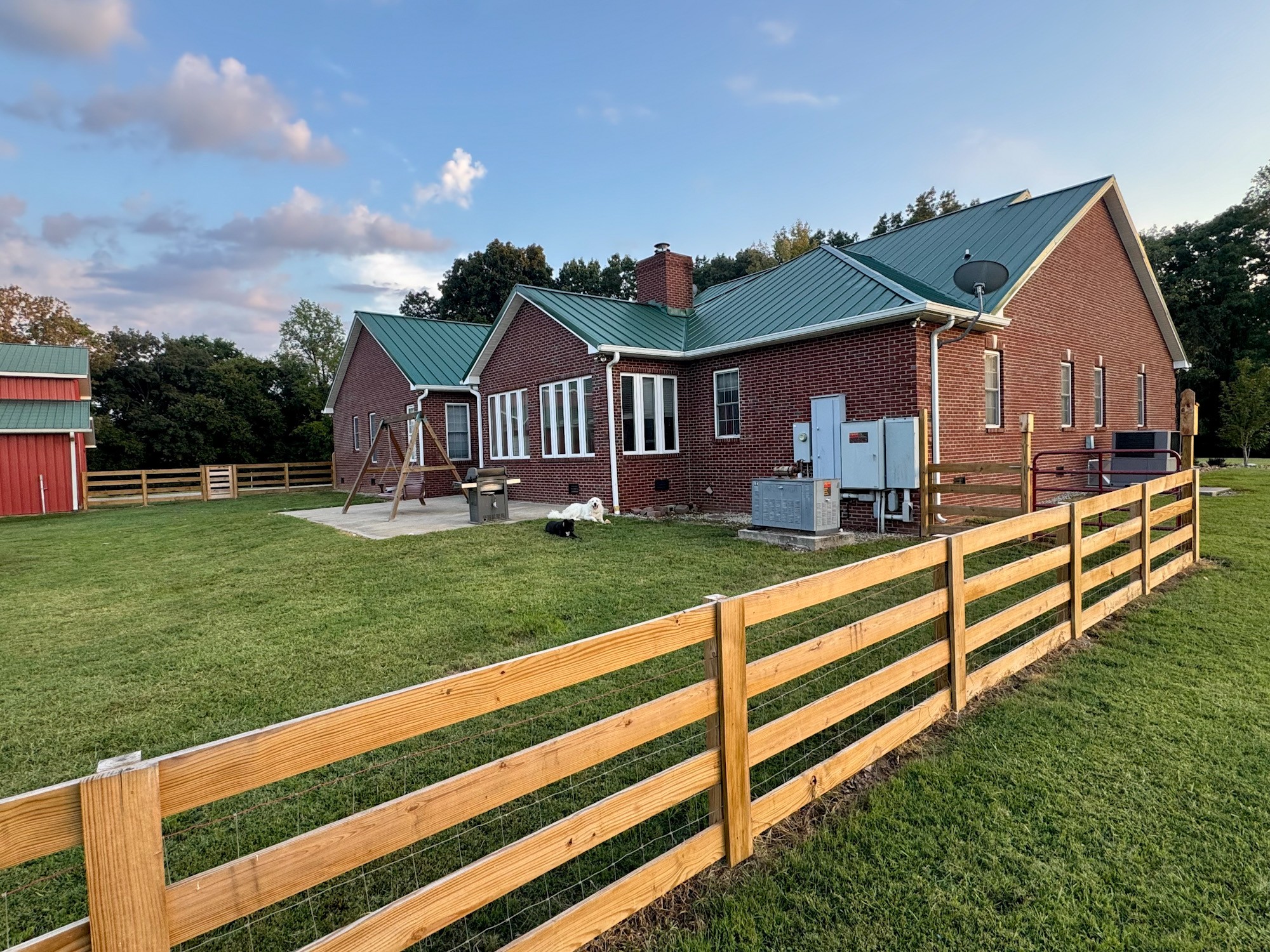 399 Edgar Meeks Road Burns, TN 37029 - Photo 9 of 28 a front view of a house with a yard
