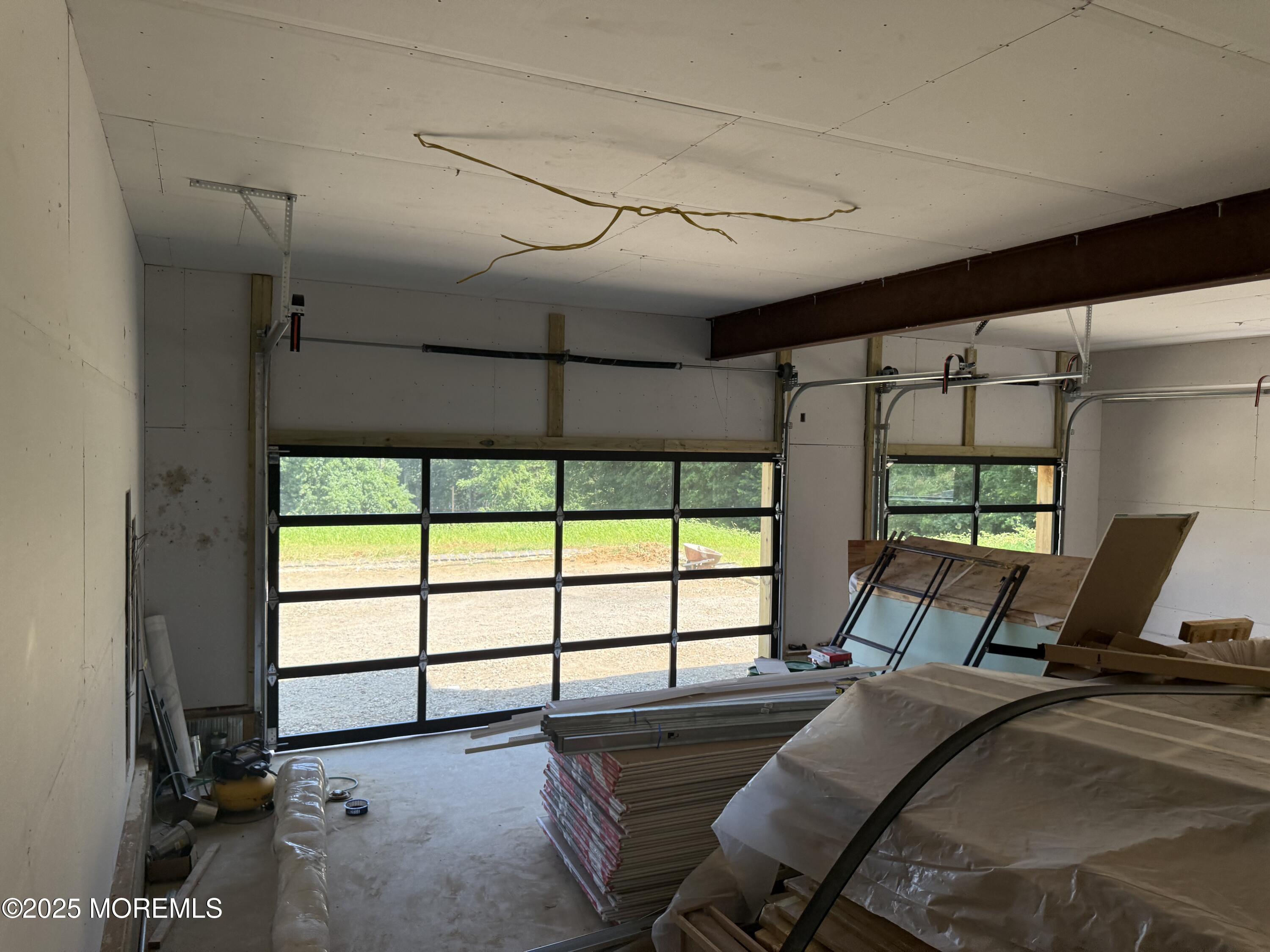 798 Holmdel Road Holmdel, NJ 07733 - Photo 11 of 19 a bed room with a bed and a chair