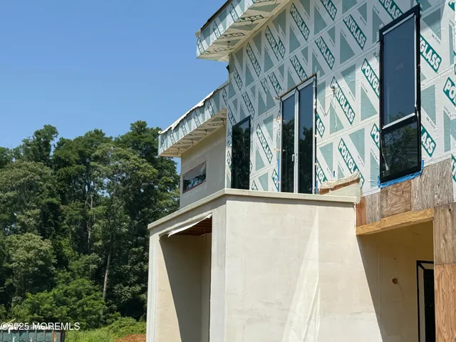 a view of a floor to ceiling window and a kitchen