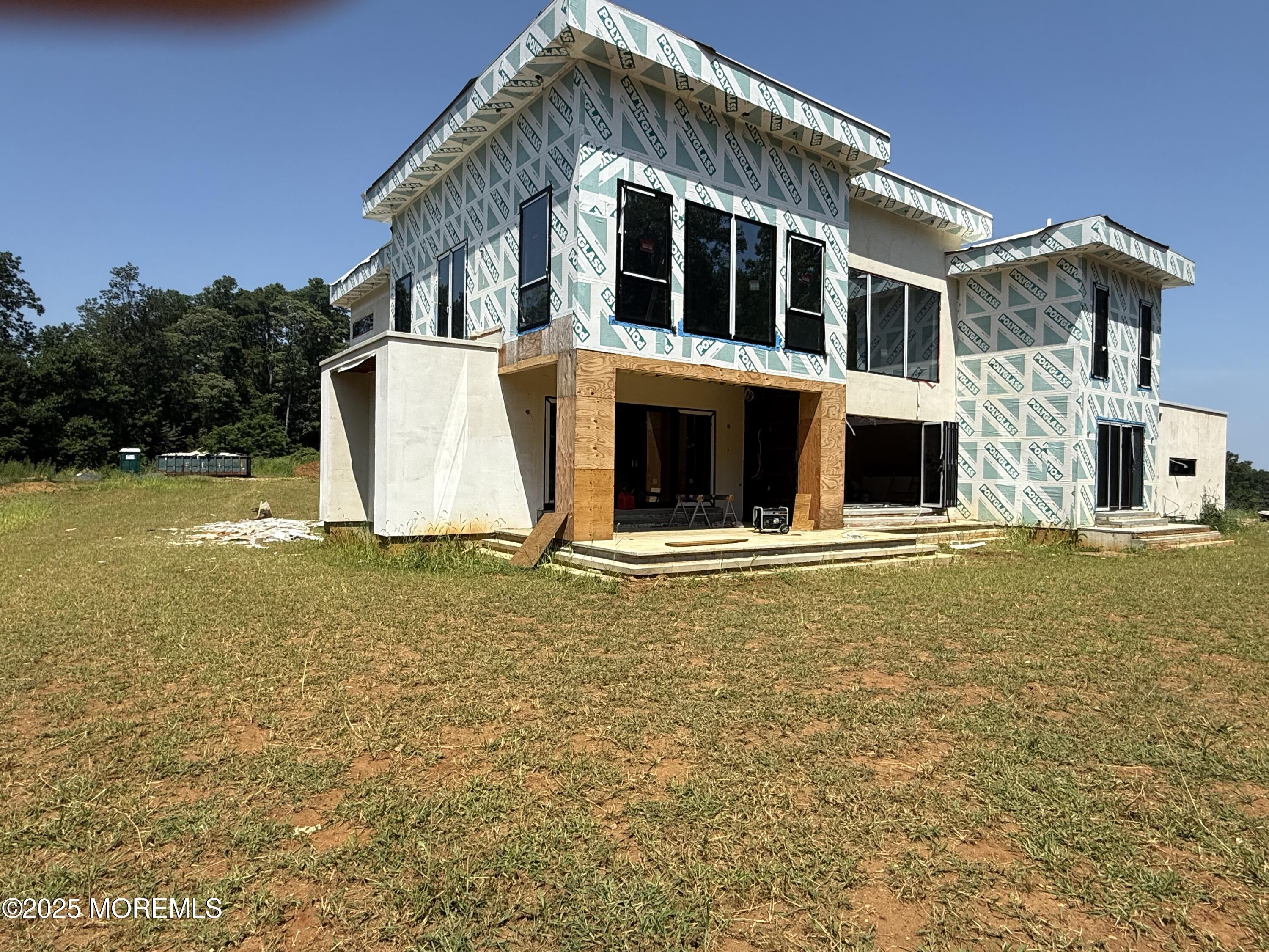 798 Holmdel Road Holmdel, NJ 07733 - Photo 9 of 19 a house view with swimming pool in front of it