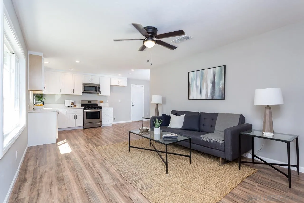 9597 Mandeville Road Santee, CA 92071 - Photo 13 of 32 a living room with furniture and kitchen view