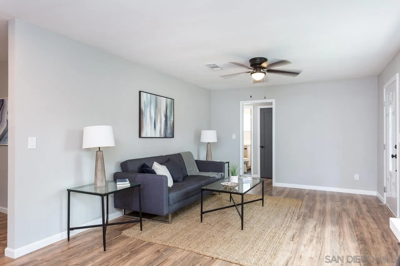 9597 Mandeville Road Santee, CA 92071 - Photo 16 of 32 a living room with furniture and a lamp