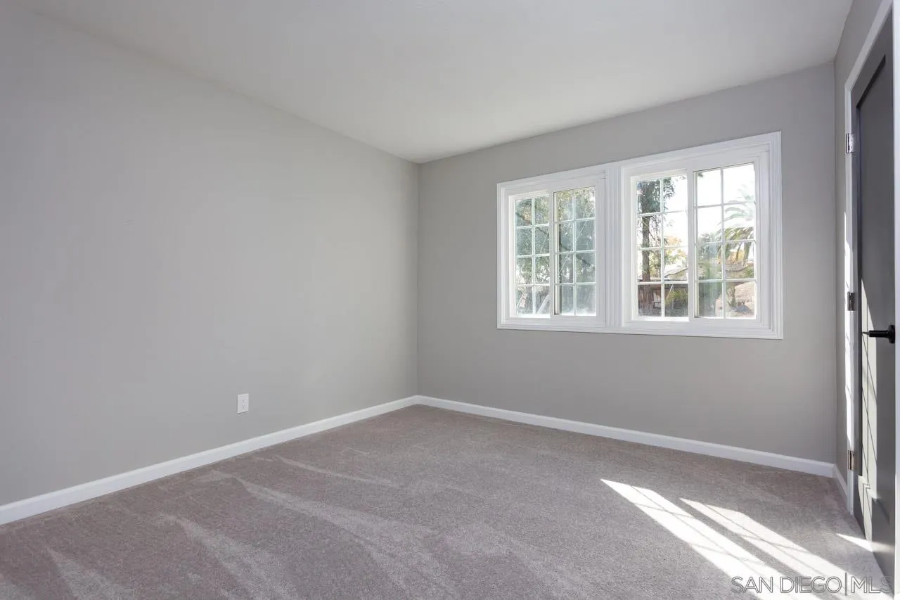 9597 Mandeville Road Santee, CA 92071 - Photo 18 of 32 a room with a window