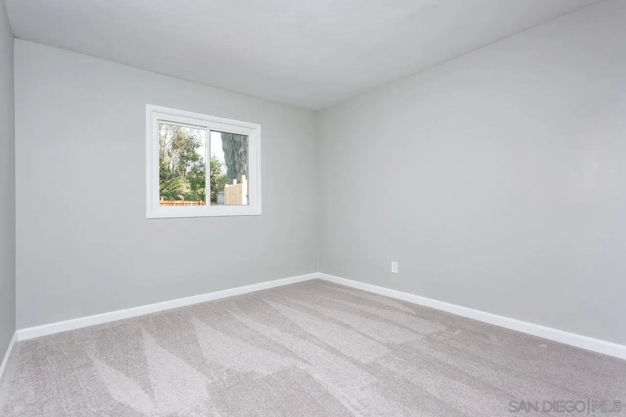 9597 Mandeville Road Santee, CA 92071 - Photo 20 of 32 a view of an empty room with a window