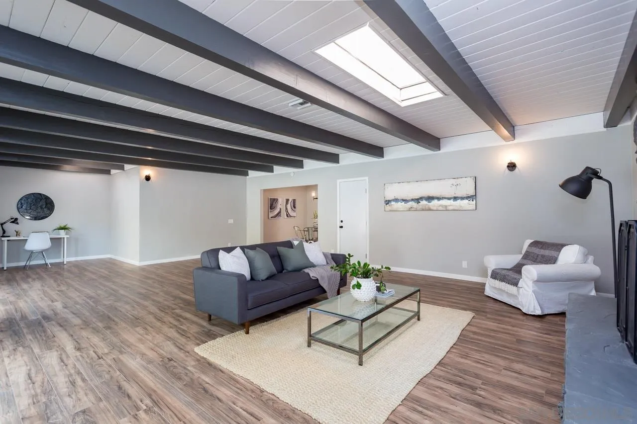 9597 Mandeville Road Santee, CA 92071 - Photo 6 of 32 a living room with furniture and a wooden floor