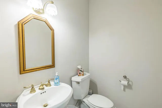 a bedroom with a bed and dresser