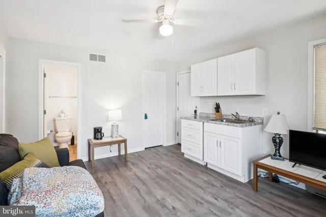 a view of a pathway with a yard