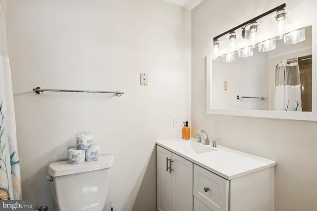 a view of an house with backyard space and a garden