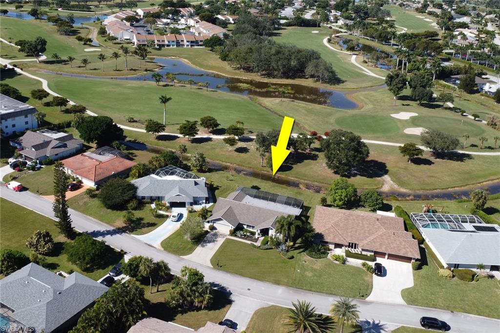 369 Hidden Valley Drive Naples, FL 34113 - Photo 39 of 49 an aerial view of residential houses with outdoor space