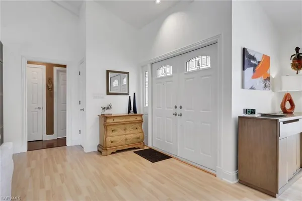 a view of a bedroom with closet and cabinet