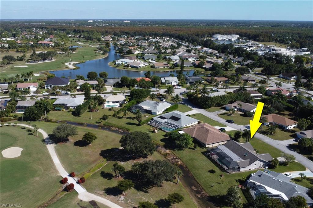 369 Hidden Valley Drive Naples, FL 34113 - Photo 43 of 49 an aerial view of residential houses with outdoor space