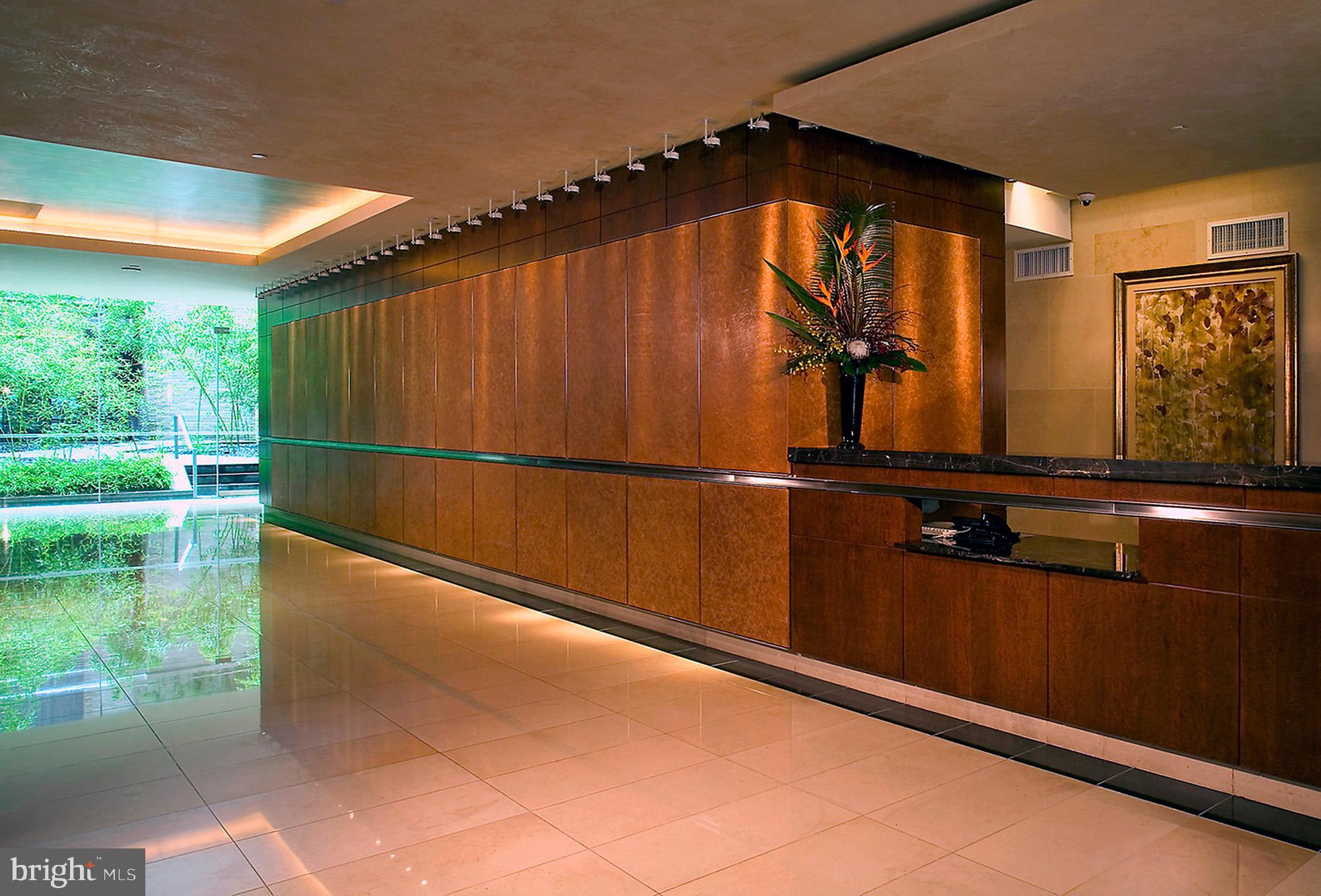 1111 23rd Street Northwest, Unit 4G Washington, DC 20037 - Photo 4 of 19 LOBBY w/ 24-HOUR CONCIERGE