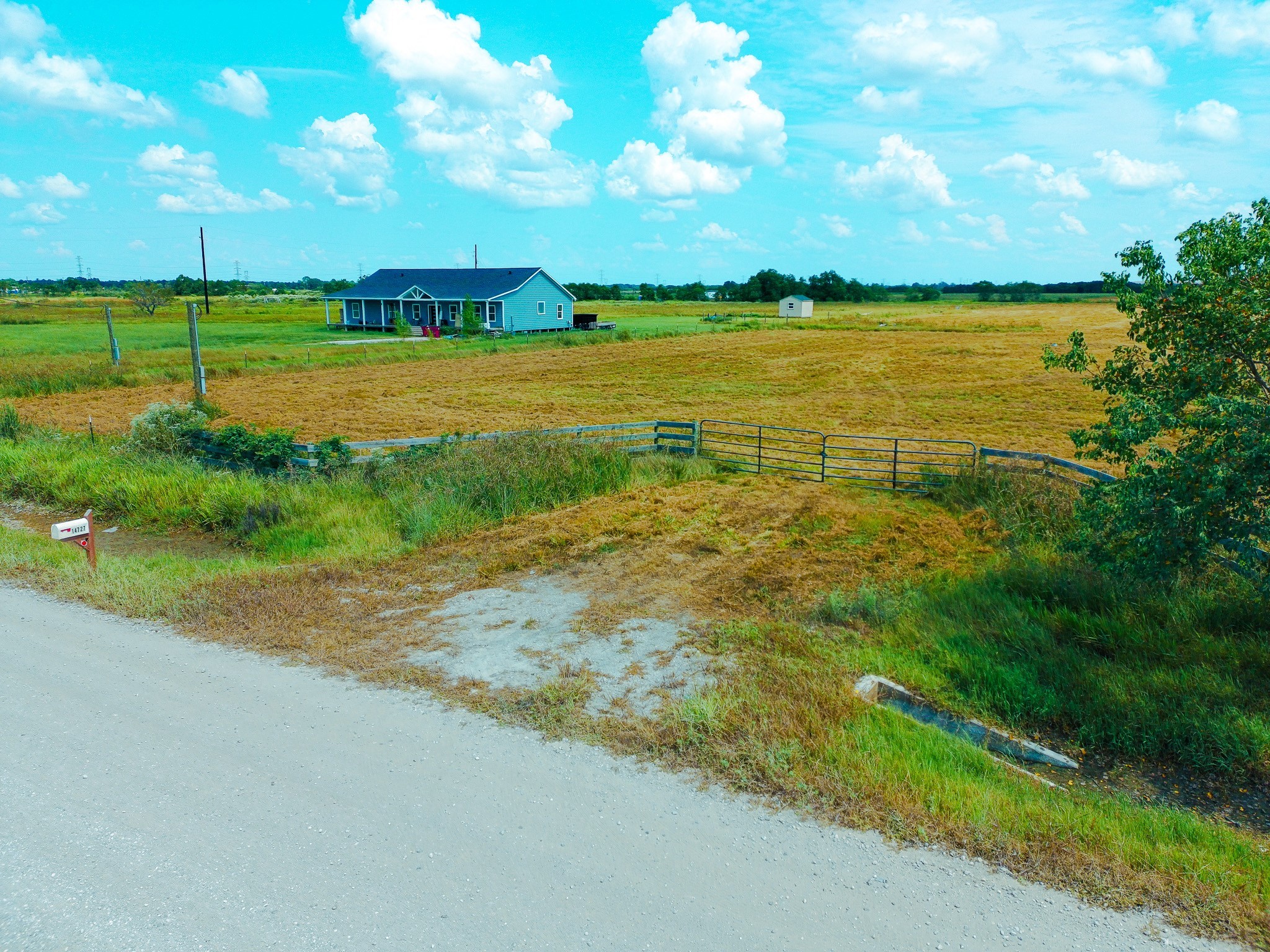 14727 Wolfgang Road Guy, TX 77444 - Photo 2 of 9 a view of an ocean and beach