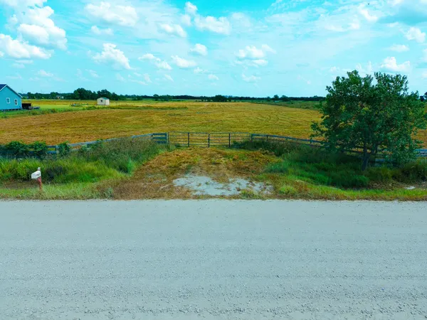 a view of a lake with a big yard