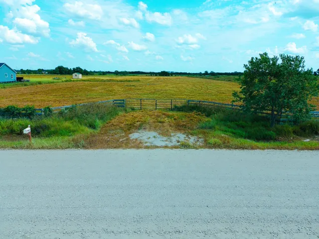 a view of a lake with a big yard