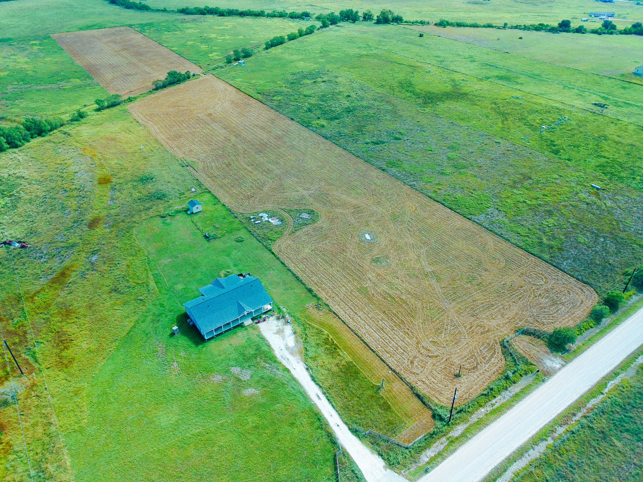 14727 Wolfgang Road Guy, TX 77444 - Photo 5 of 9 an aerial view of a house