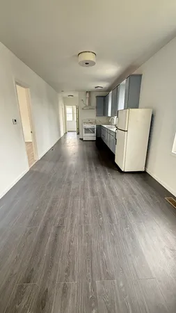 a view of living room and kitchen with furniture