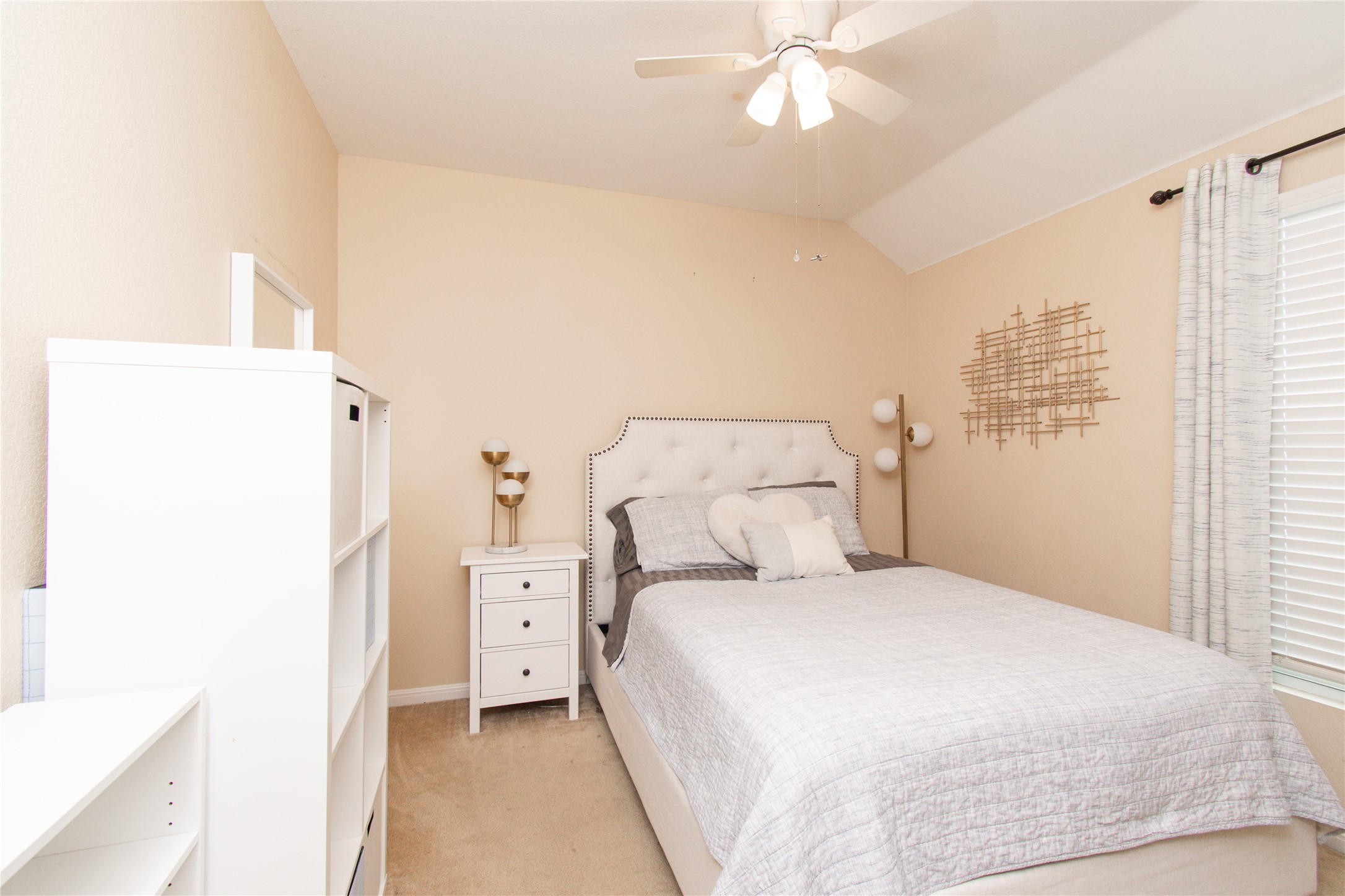 421 Shadow Point San Marcos, TX 78666 - Photo 19 of 24 Bedroom featuring light carpet, ceiling fan, and vaulted ceiling