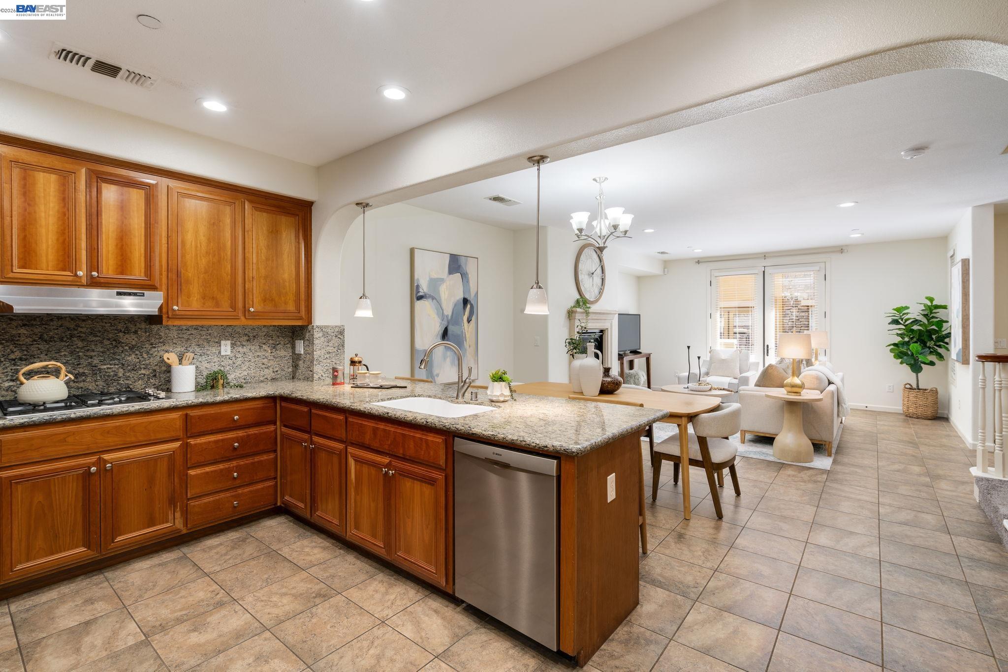 4653 Rimini Court Dublin, CA 94568 - Photo 17 of 44 a kitchen with furniture a sink a counter top space and appliances