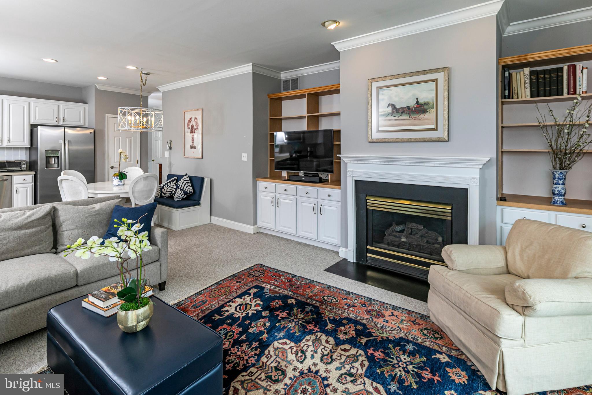 24 Foster Road Pennington, NJ 08534 - Photo 11 of 38 a living room with furniture and a fireplace