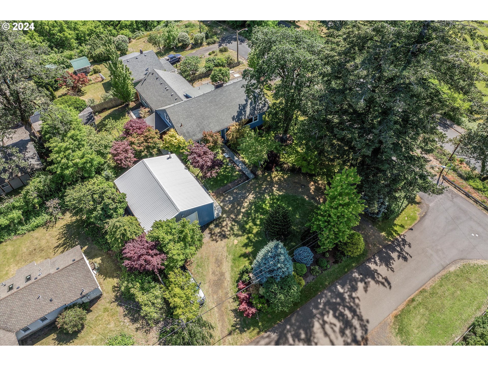 210 Southwest Ruckel Street Cascade Locks, OR 97014 - Photo 2 of 41 an aerial view of a house with outdoor space and street view